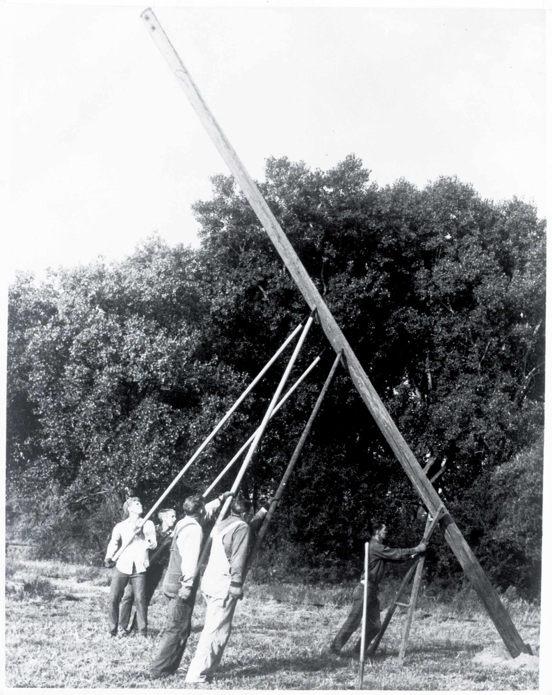 Linemen Setting Poles